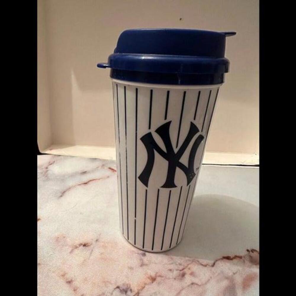 Sip in Sporting Style with the Yankees Travel Mug!
